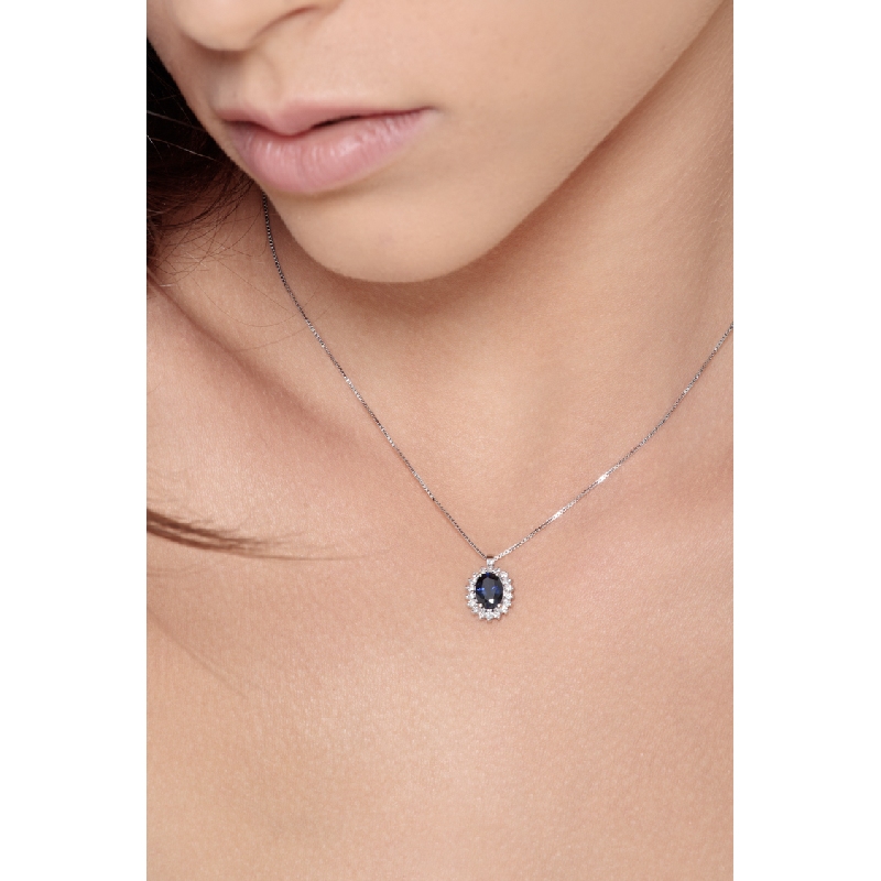 Necklace with pendant, central oval cut blue sapphire and diamonds