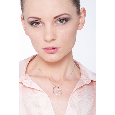 18k white gold inclined fancy heart pendant with diamonds