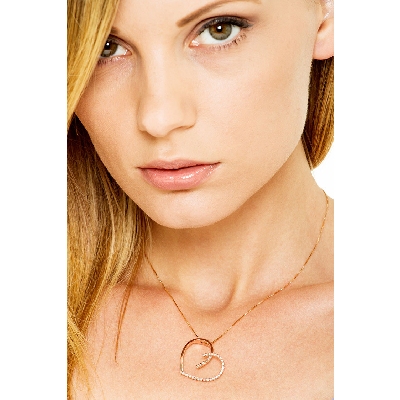 18k rose gold inclined fancy heart pendant with diamonds