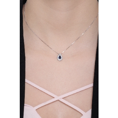 Necklace with pendant, diamonds and a pear cut blue sapphire