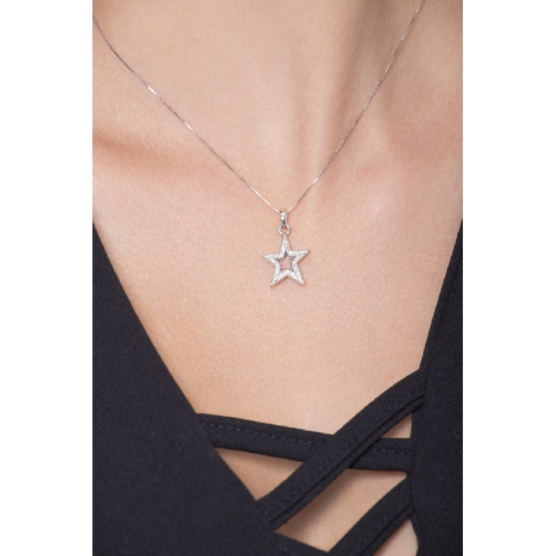 Star shaped pendant with round cut diamonds