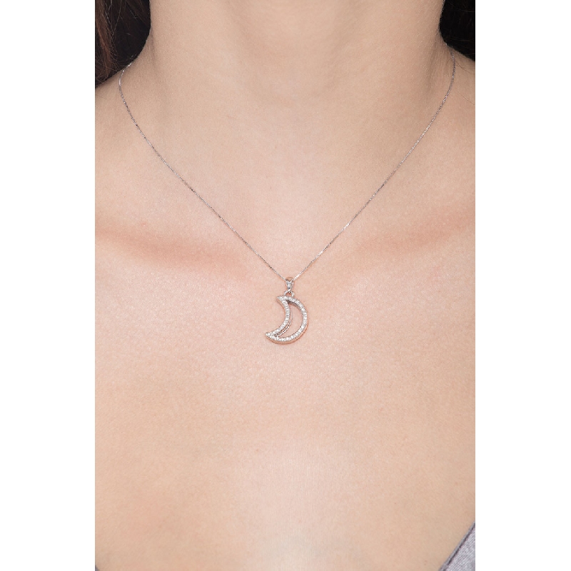 Half moon pendant with diamonds