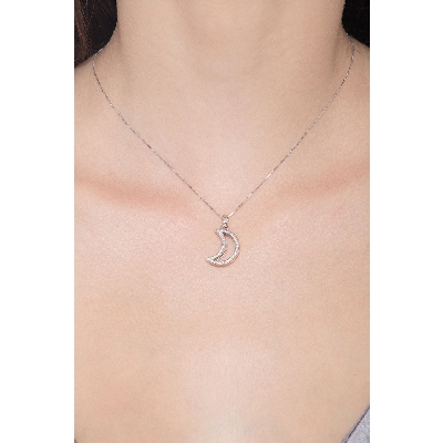 Half moon pendant with diamonds