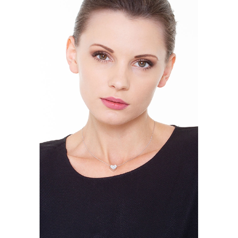 Heart shape pendant in 19k white gold with diamonds