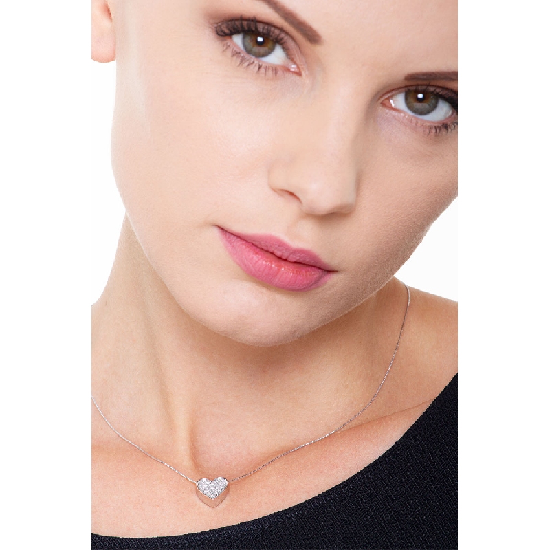Heart shape pendant in 19k white gold with diamonds