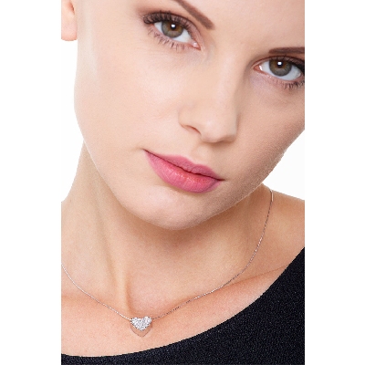 Heart shape pendant in 19k white gold with diamonds