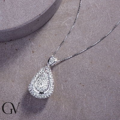 Elegant drop shaped pendant with round cut diamonds