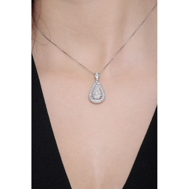 Elegant drop shaped pendant with round cut diamonds