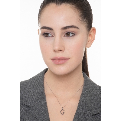 18k white gold letter G with black diamonds