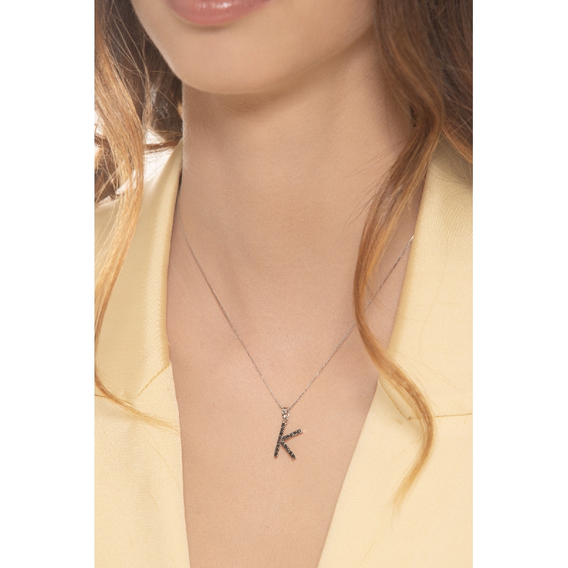18k white gold necklace with letter k pendant with black diamonds