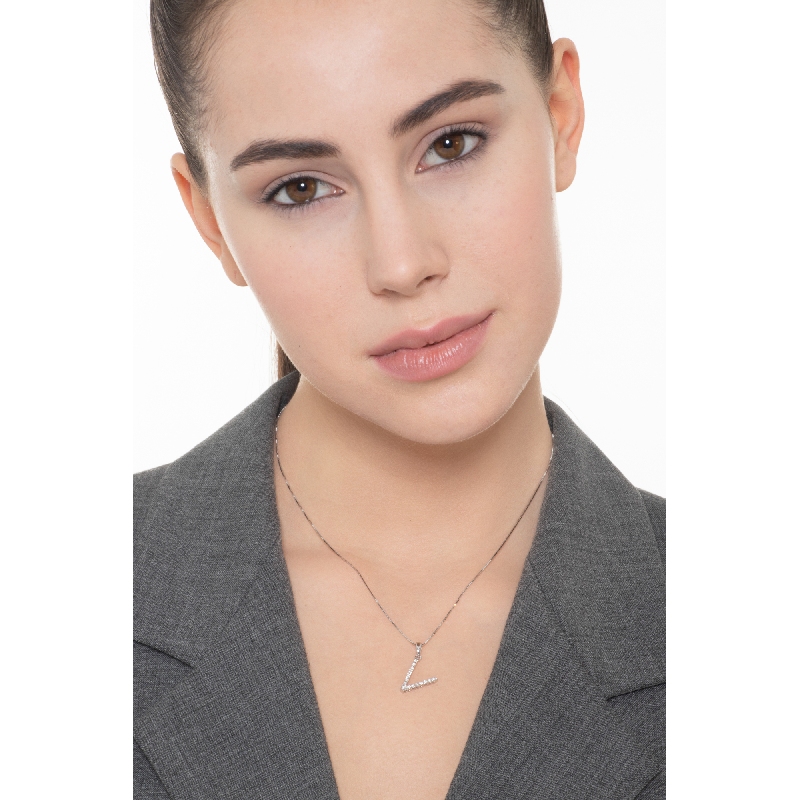 Letter V pendant with round cut diamonds