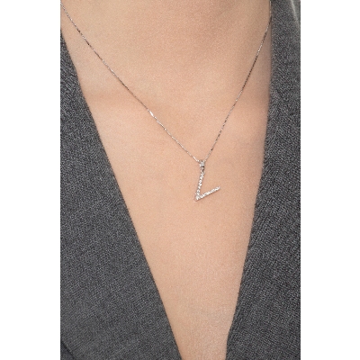 Letter V pendant with round cut diamonds