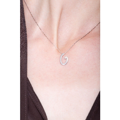 18k white gold letter G with solitaire diamond