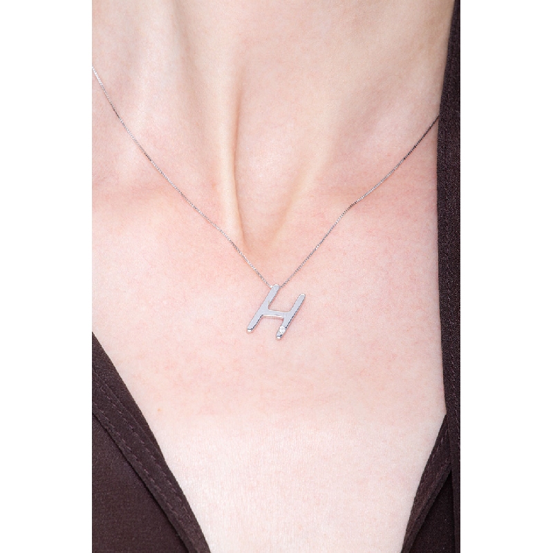 18k white gold letter H with solitaire diamond