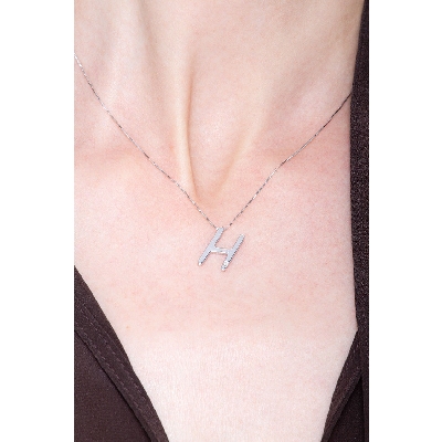 18k white gold letter H with solitaire diamond