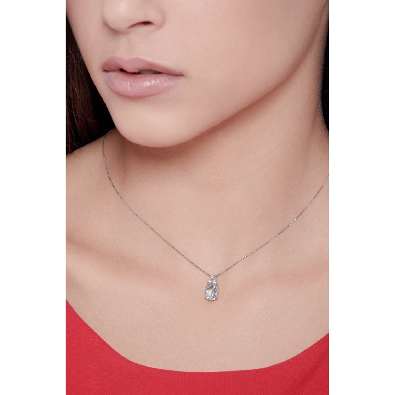 18k white gold necklace with diamonds and oval cut aquamarine pendant