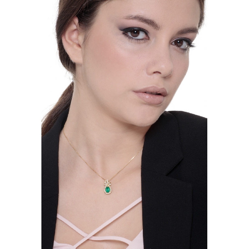 Necklace with pendant, pear shape emerald and diamonds