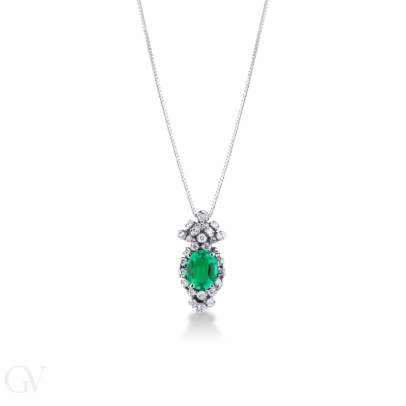 Fancy oval emerald and diamond pendant