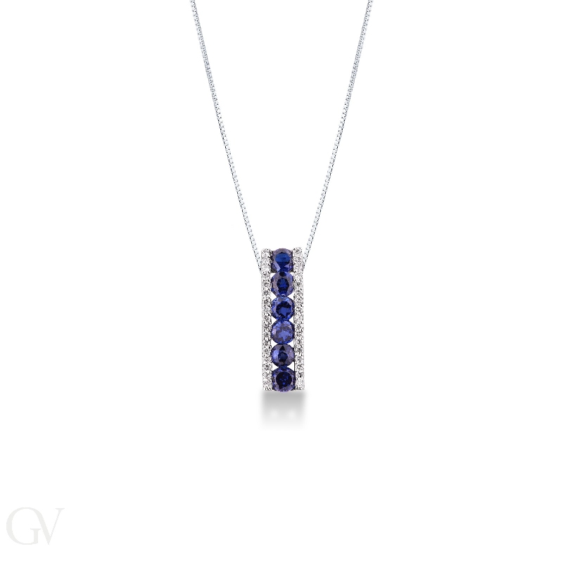 18k white gold bar pendant with diamonds and blue sapphires