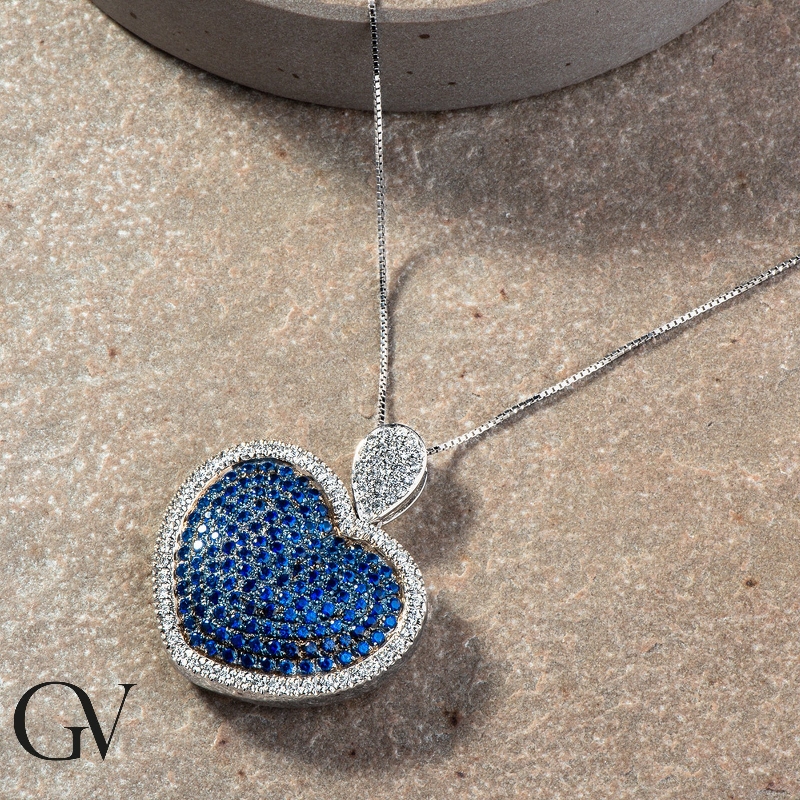 Heart pendant with blue sapphires and diamonds