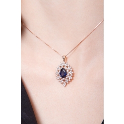 Necklace with pendant, central pear cut sapphire and a fancy crown of diamonds 2