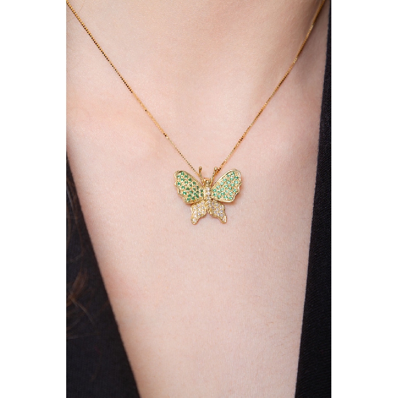 18k yellow gold butterfly pendant with diamonds and emeralds