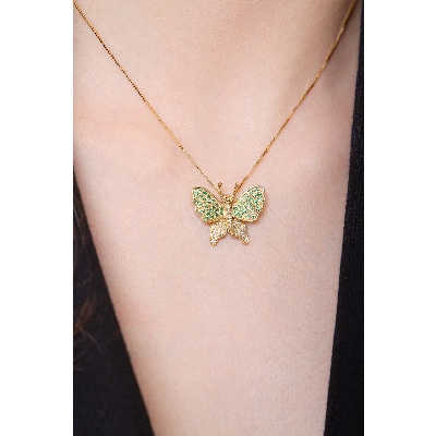 18k yellow gold butterfly pendant with diamonds and emeralds