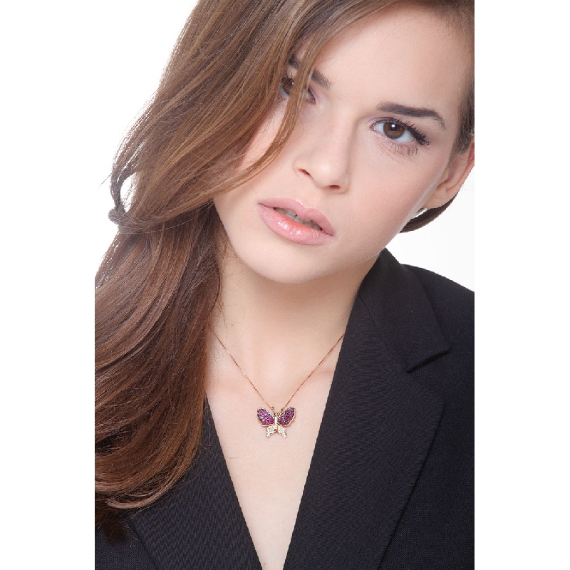 18k rose gold butterfly pendant with rubies and round cut diamonds