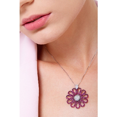 Flower pendant with 11 rubies petals and diamonds