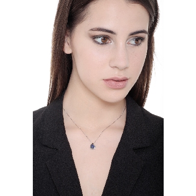 Fancy pendant with sapphires on burnished top