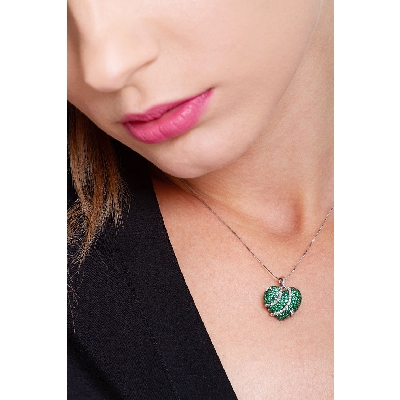 Burnished heart pendant with emeralds and diamonds