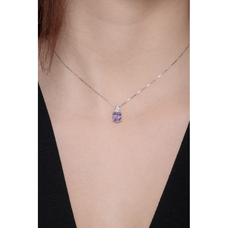 Oval Amethyst pendant with diamonds