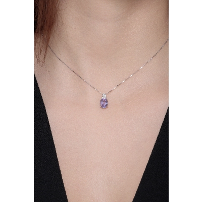 Oval Amethyst pendant with diamonds