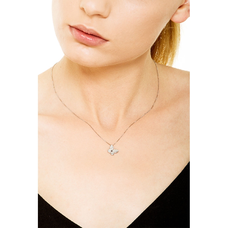 Inclined butterfly pendant with a wing full of diamonds