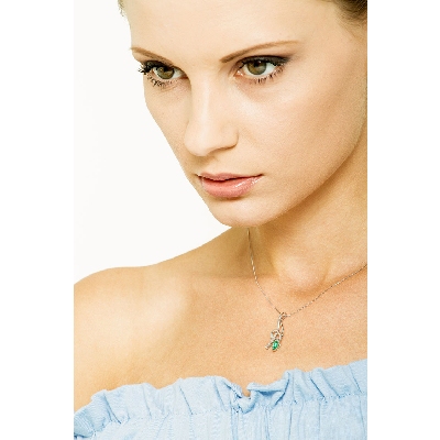 Snake pendant with emerald and diamonds