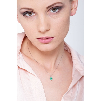 Emerald and diamond pendant in 18k white gold