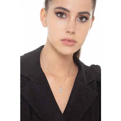 18k white gold child pendant with one diamond