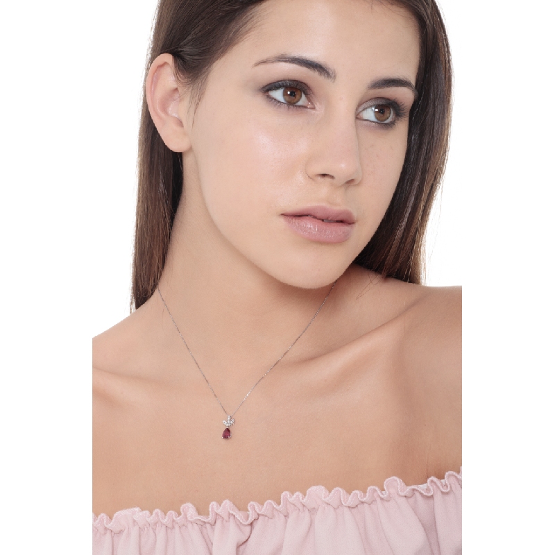 18k white gold pendant with 3 diamond leaves and ruby