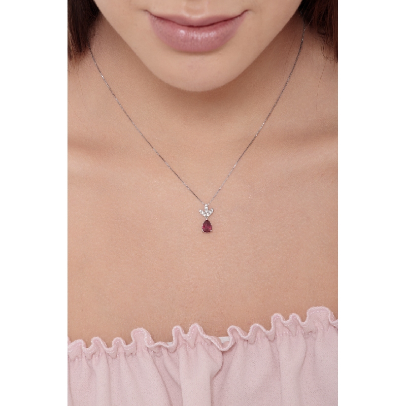 18k white gold pendant with 3 diamond leaves and ruby