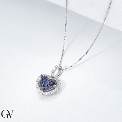 Fancy heart pendant with diamond and blue sapphires 