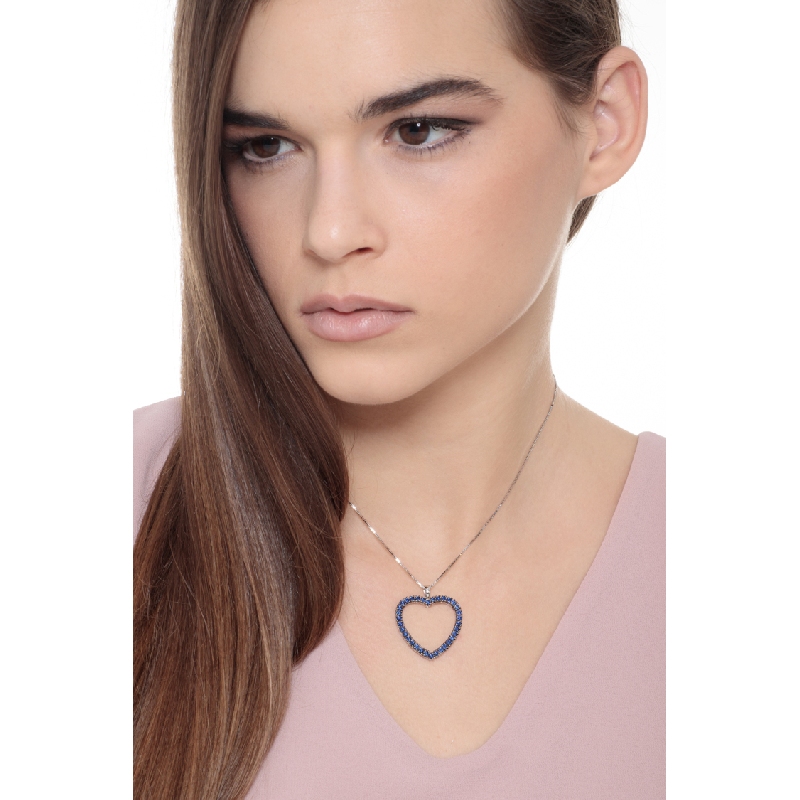 Heart pendant with burnished blue sapphires 