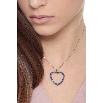 Heart pendant with burnished blue sapphires 