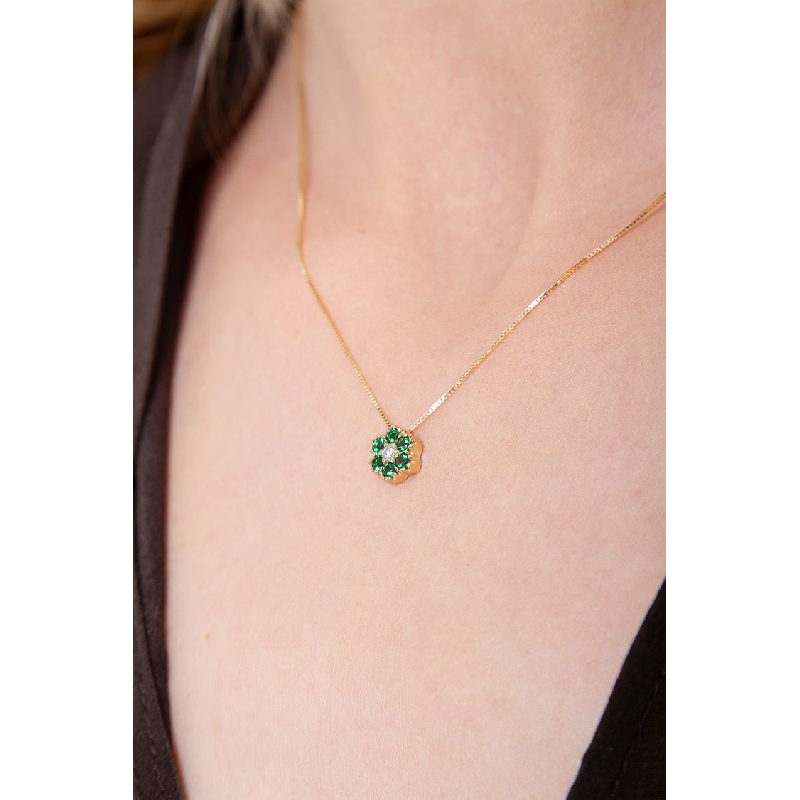 Little flower pendant in 18k yellow gold with diamonds and emeralds