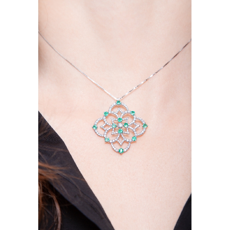 Rose window pendant in 18k white gold with emeralds and diamonds