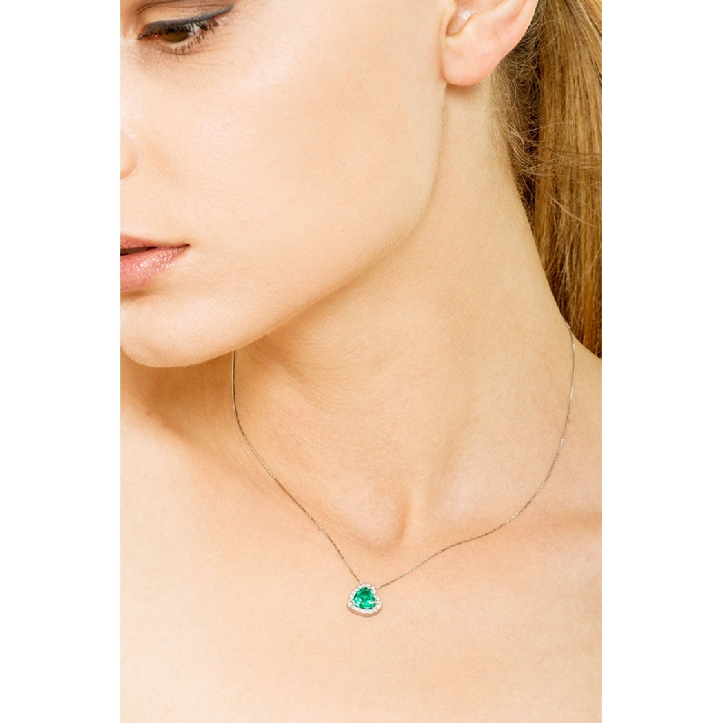 Necklace with emerald and diamond heart shaped pendant