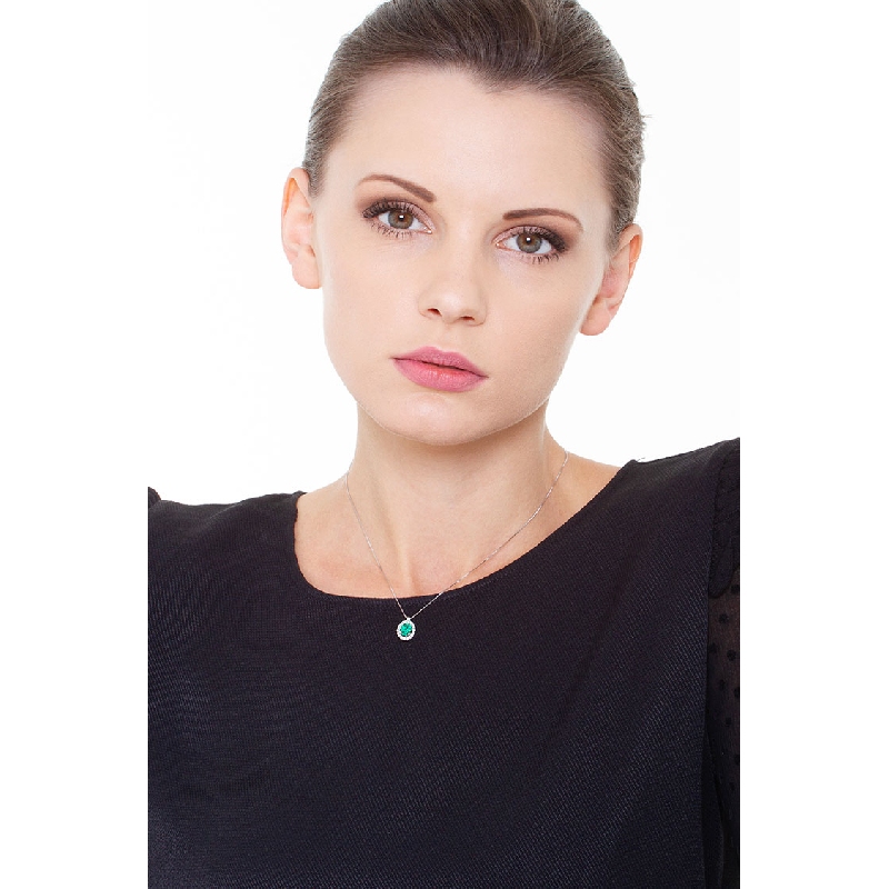 Necklace with pendant, central oval emerald  and  a row of diamonds