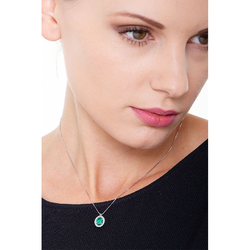 Necklace with pendant, central oval emerald  and  a row of diamonds