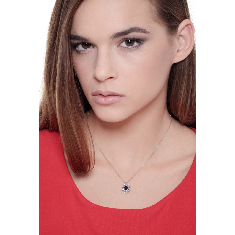 Necklace with pendant, central blue sapphire and a fancy diamonds crown