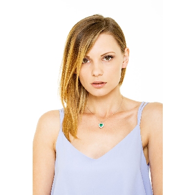 Necklace with pendant, central heart cut emerald and diamonds