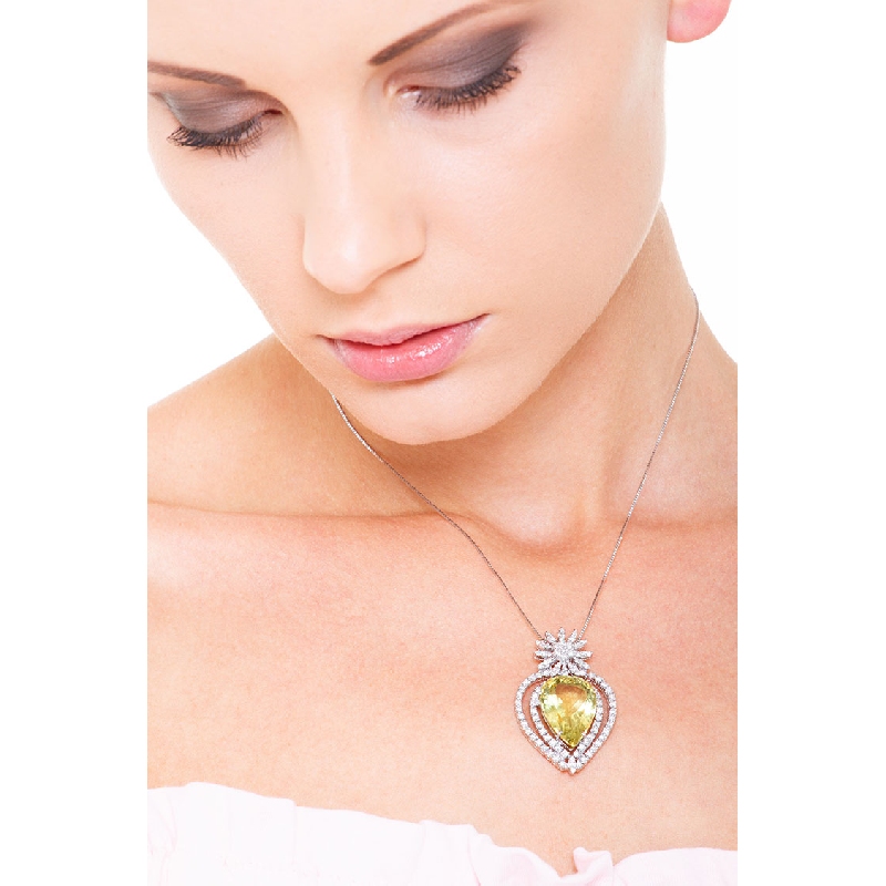 18k white gold fancy pendant with peridot and diamonds